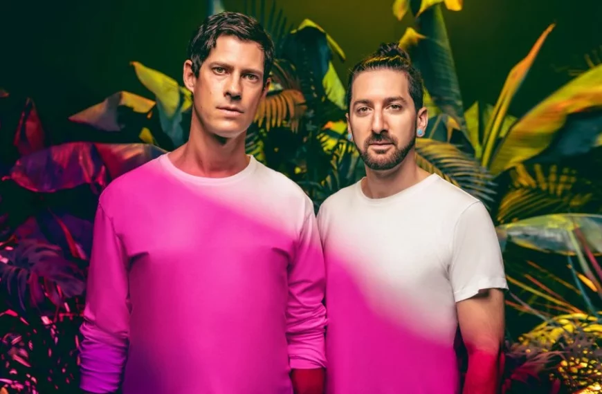 two men standing next to each other