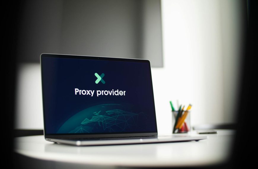 prawne zabezpieczenie DJ-ów - Laptop screen showing 'Proxy provider' in a tech office setting, focus on cybersecurity.